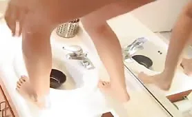 Two asian girls poop by turn