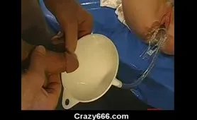 German blonde squirting into a tube and box