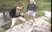 Beautiful blonde babe shitting under a bridge