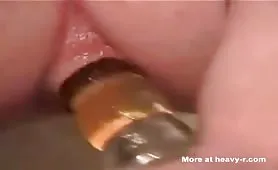 Brown haired babe eats big turd